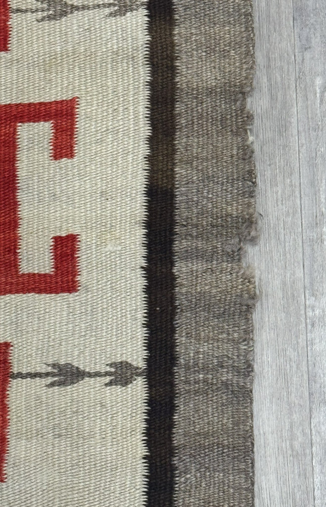 An Early Navajo Klagatoh Rug with Corn Plant Motif Banding