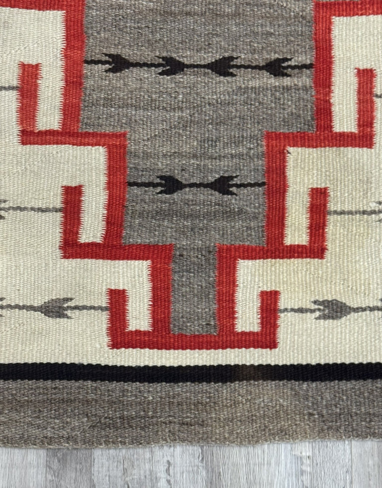 An Early Navajo Klagatoh Rug with Corn Plant Motif Banding