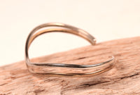 Navajo Sterling Silver and Brass Offset Bracelet