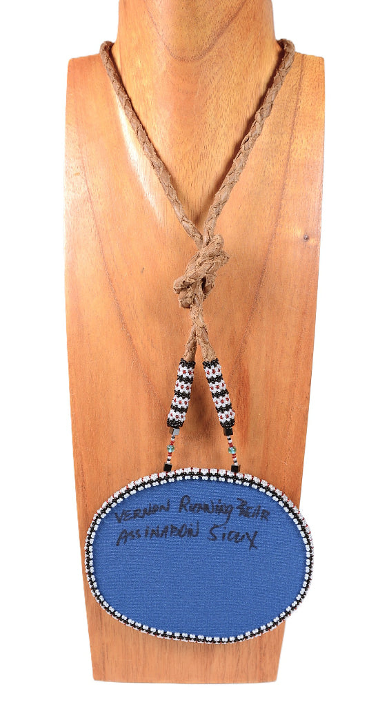 Sioux/Assinaboin Beaded Pendant on Hide By Vernon Running Bear