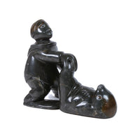 Eskimo Man and Seal Sculpture