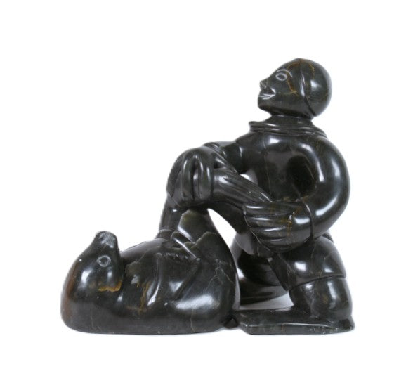 Eskimo Man and Seal Sculpture