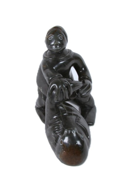 Eskimo Man and Seal Sculpture