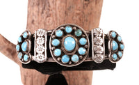 Zuni Sterling Silver Bracelet with 22 Blue Round Turquoise Settings in Flower Design