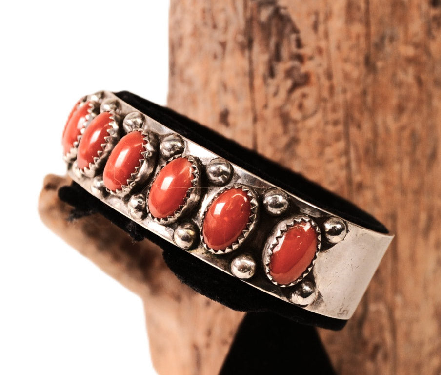 Navajo Sterling Silver Bracelet with Nine Coral Settings by Paul Lawrence