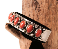 Navajo Sterling Silver Bracelet with Nine Coral Settings by Paul Lawrence