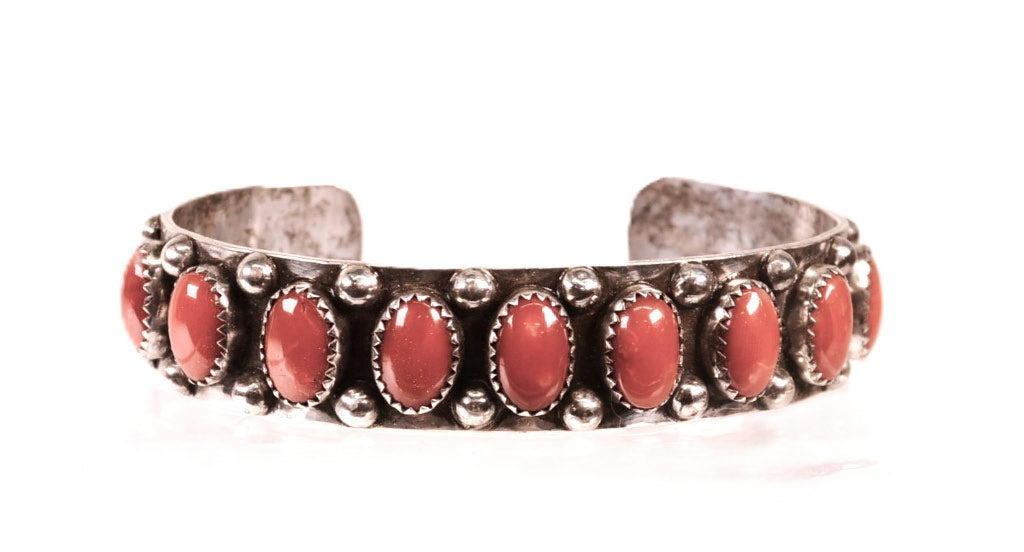 Navajo Sterling Silver Bracelet with Nine Coral Settings by Paul Lawrence