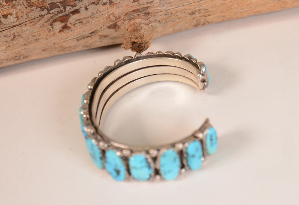 Navajo Sterling Silver Cuff Bracelet with 16 Turquoise Settings