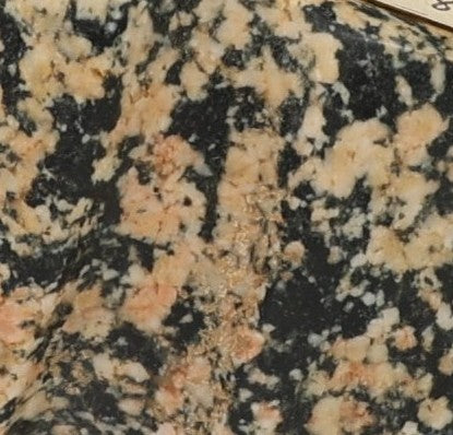Early Man Small Mottled Axe Head