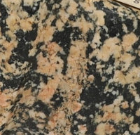Early Man Small Mottled Axe Head