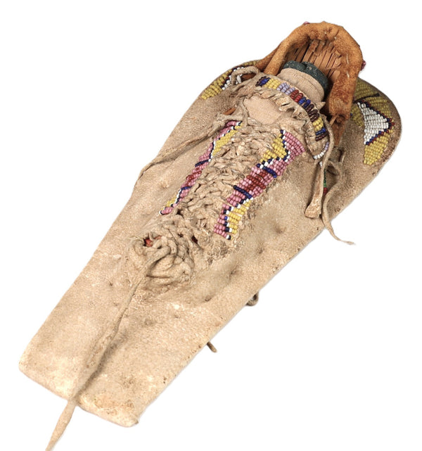 An Early Ute Beaded Toy Cradle Doll