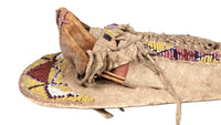 An Early Ute Beaded Toy Cradle Doll