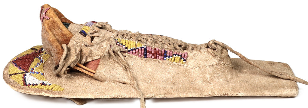 An Early Ute Beaded Toy Cradle Doll