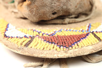 An Early Ute Beaded Toy Cradle Doll