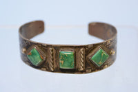 Early Navajo bracelet with early square cut turquoise settings