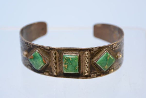 Early Navajo bracelet with early square cut turquoise settings