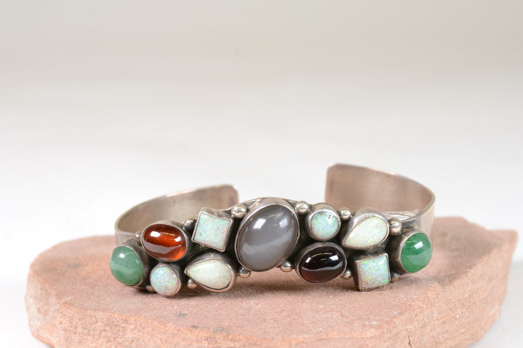 Contemporary Navajo hand made Bracelet with multiple stone settings