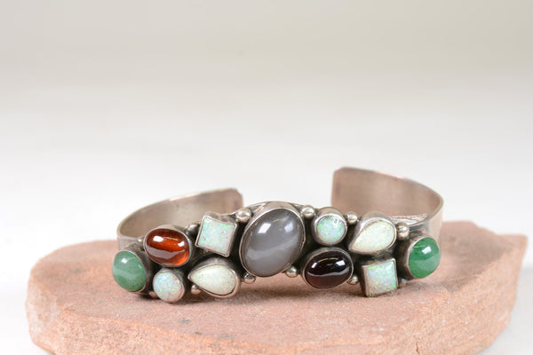 Contemporary Navajo hand made Bracelet with multiple stone settings
