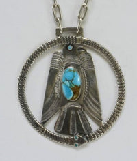 An Early Harvey Navajo Thunderbird and Snake Pendant