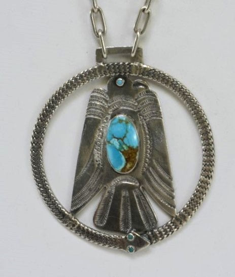An Early Harvey Navajo Thunderbird and Snake Pendant