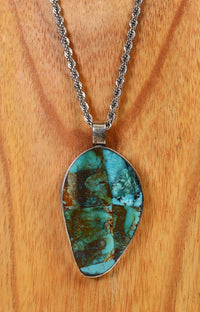 Navajo or Santo Domingo Turquoise pendant and mother of pearl 2 sided