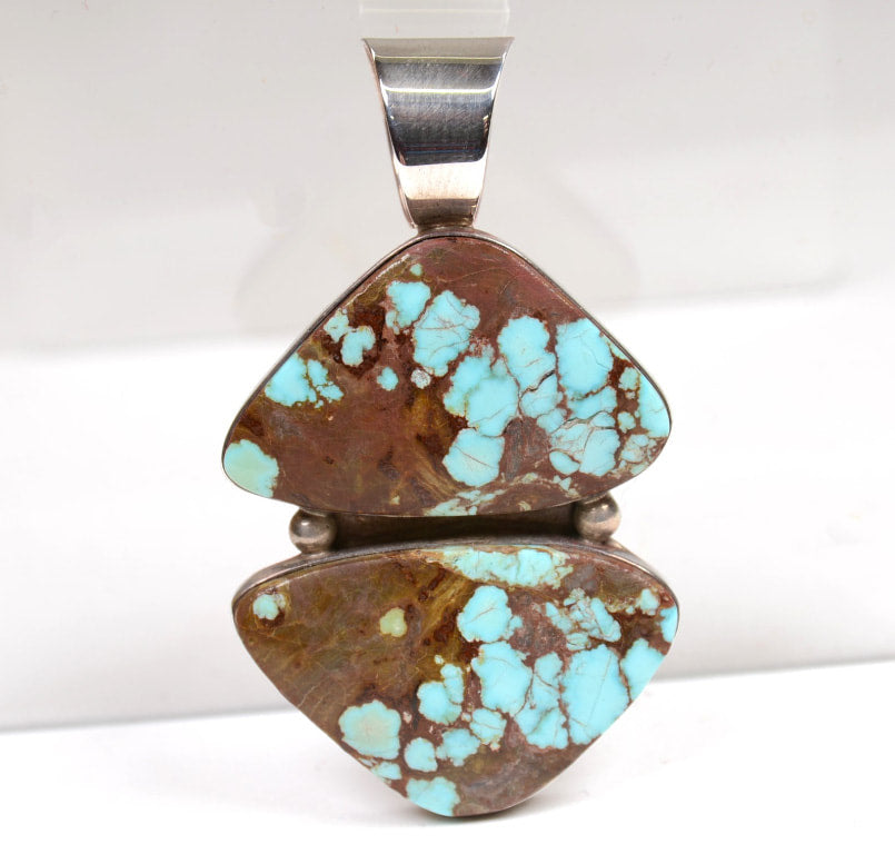 Navajo Pendant: Sterling Silver and Two Triangular Roystone NV Turquoise Stones