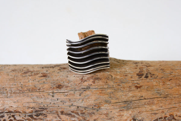 Navajo Ring; Sterling Silver "Wave" design Size: 7
