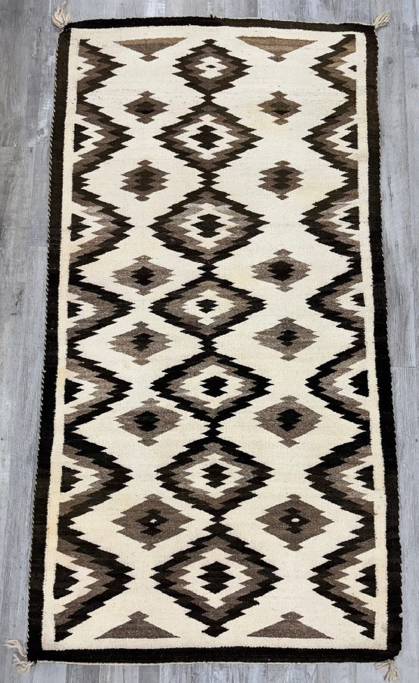 Navajo Rug with Natural wool tones: Storm Cloud Motif
