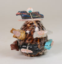 Zuni 6 Fetishes on a Polished Shell by Jayne Quam