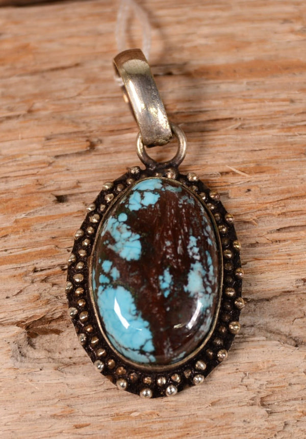 Navajo Blue Turquoise Cabuchon with Dark Matrix in Sterling Silver Pendant
