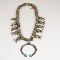 A Navajo Coin Squash Blossom Necklace