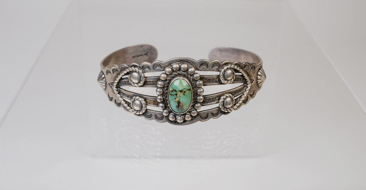 Navajo Cuff Bracelet: Harvey Style / One Green Turquoise Setting / Triangle and Arrow Motifs