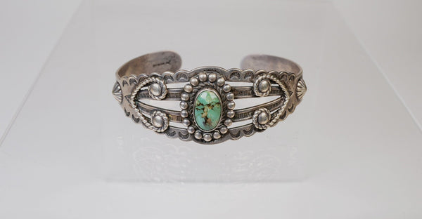 Navajo Cuff Bracelet: Harvey Style / One Green Turquoise Setting / Triangle and Arrow Motifs