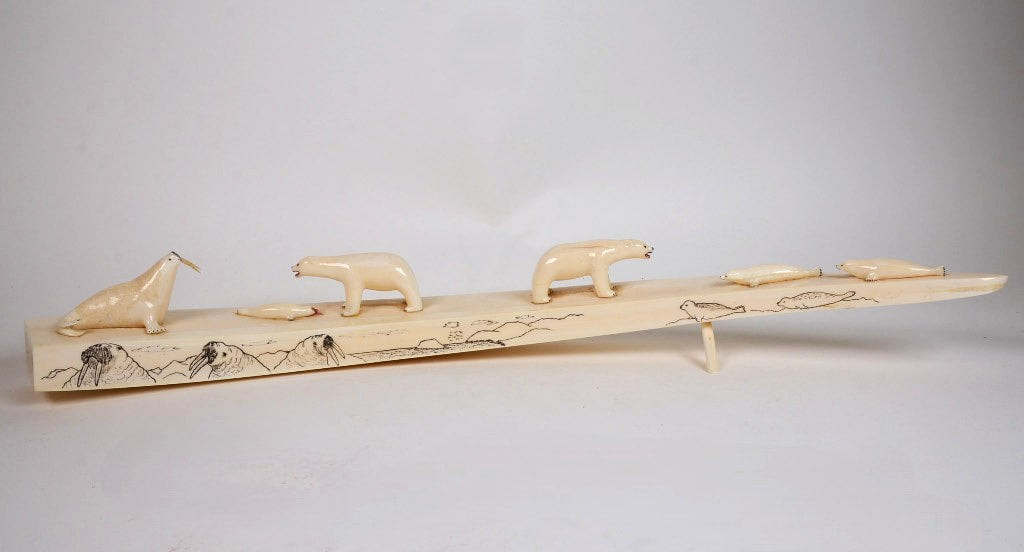 Eskimo Walrus Tusk with Animal Figures and Scrimshaw; by Joe Iya Sr.