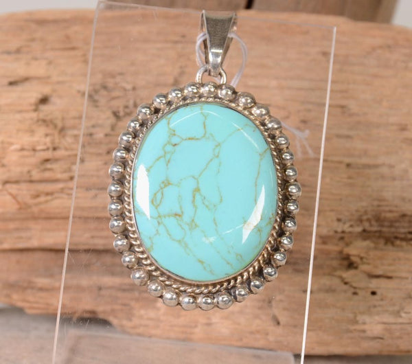 Navajo Sterling Silver Pendant with Turquoise